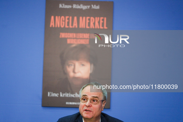 Author Klaus-Rudiger Mai presents his book 'Angela Merkel - Between Legend and Reality' at a press conference in Berlin, Germany, on Novembe...