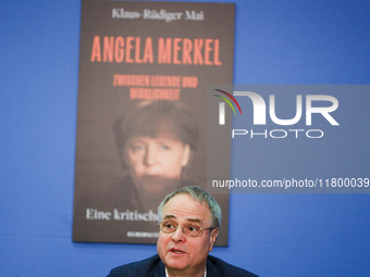 Author Klaus-Rudiger Mai presents his book 'Angela Merkel - Between Legend and Reality' at a press conference in Berlin, Germany, on Novembe...