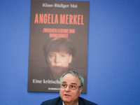 Author Klaus-Rudiger Mai presents his book 'Angela Merkel - Between Legend and Reality' at a press conference in Berlin, Germany, on Novembe...