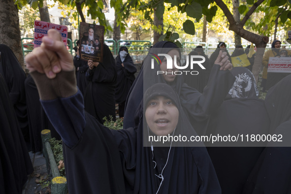 Veiled Iranian women shout anti-UN, anti-U.S., and anti-Israeli slogans during an anti-Israeli rally in front of the United Nations office i...