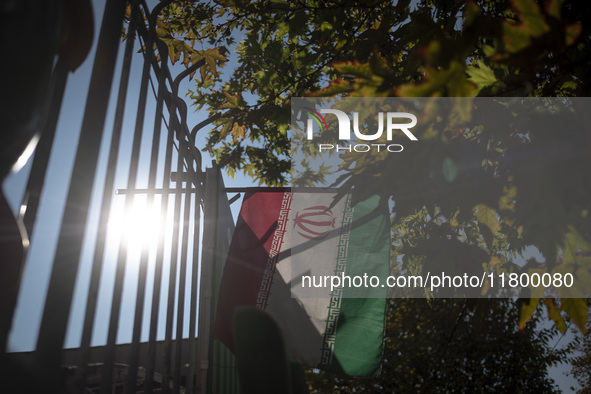 An Iranian flag is pictured after an anti-Israeli rally in front of the United Nations (UN) office in northern Tehran, Iran, on November 22,...