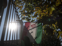 An Iranian flag is pictured after an anti-Israeli rally in front of the United Nations (UN) office in northern Tehran, Iran, on November 22,...