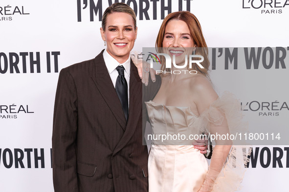 Ashlyn Harris and girlfriend Sophia Bush arrive at the 19th Annual L'Oreal Paris' Women Of Worth Celebration 2024 held at NeueHouse Hollywoo...