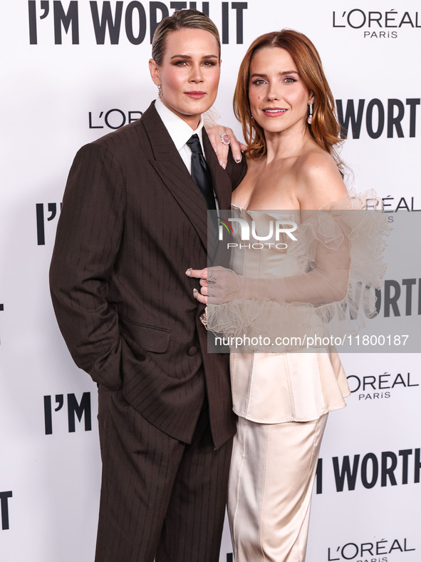 Ashlyn Harris and girlfriend Sophia Bush arrive at the 19th Annual L'Oreal Paris' Women Of Worth Celebration 2024 held at NeueHouse Hollywoo...