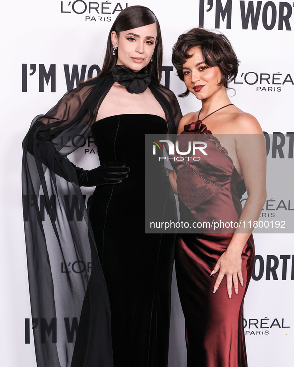 Sofia Carson and Isabela Moner Merced arrive at the 19th Annual L'Oreal Paris' Women Of Worth Celebration 2024 held at NeueHouse Hollywood o...