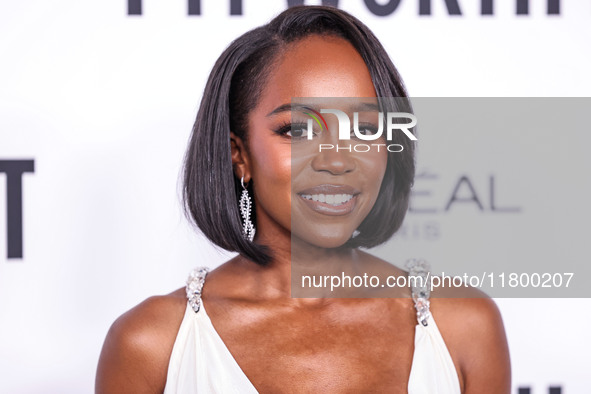 Aja Naomi King arrives at the 19th Annual L'Oreal Paris' Women Of Worth Celebration 2024 held at NeueHouse Hollywood on November 21, 2024 in...