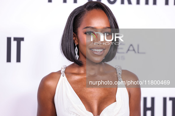 Aja Naomi King arrives at the 19th Annual L'Oreal Paris' Women Of Worth Celebration 2024 held at NeueHouse Hollywood on November 21, 2024 in...