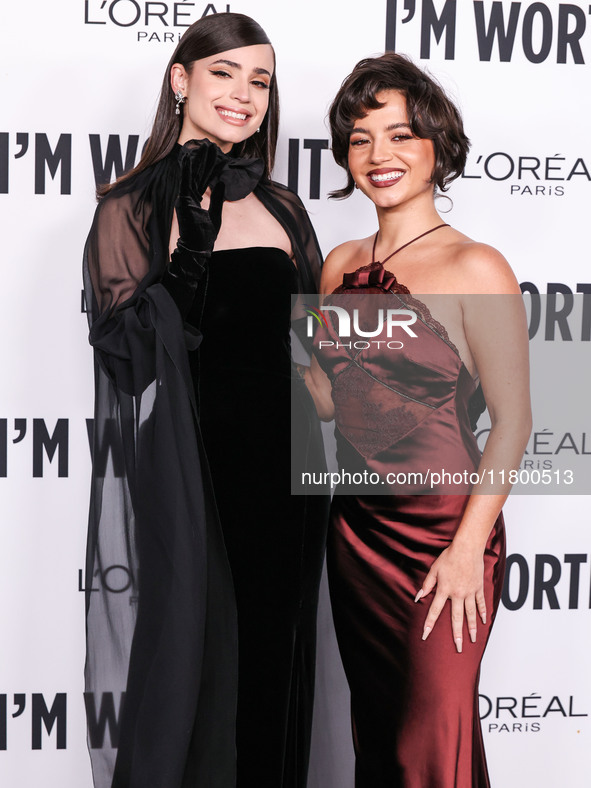 Sofia Carson and Isabela Moner Merced arrive at the 19th Annual L'Oreal Paris' Women Of Worth Celebration 2024 held at NeueHouse Hollywood o...