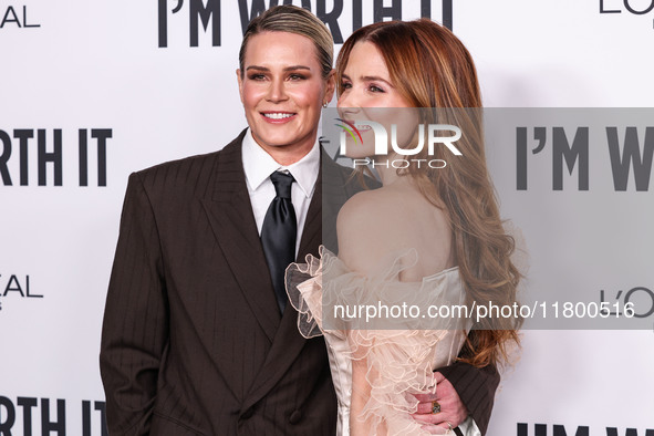 Ashlyn Harris and girlfriend Sophia Bush arrive at the 19th Annual L'Oreal Paris' Women Of Worth Celebration 2024 held at NeueHouse Hollywoo...