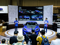 Ismail Ashlan, Marketing Communications Manager, Subaru Indonesia (R), explains the Subaru BRZ Drift Edition during The Gaikindo Jakarta Aut...