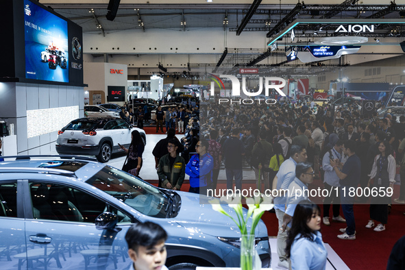 Visitors look at vehicles displayed during The Gaikindo Jakarta Auto Week in Tangerang, Indonesia, on November 22, 2024. The show, the natio...