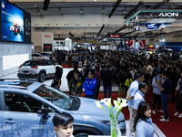 Visitors look at vehicles displayed during The Gaikindo Jakarta Auto Week in Tangerang, Indonesia, on November 22, 2024. The show, the natio...