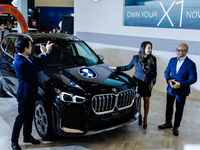 Peter ''Sunny'' Medalla, President Director of BMW Group Indonesia, Jodie O'tania, Director of Communications for BMW Group Indonesia, and Y...