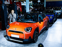 Jin Han Ng, Sales Manager and Product Manager for MINI Asia, explains the All-Electric MINI Aceman during The Gaikindo Jakarta Auto Week in...