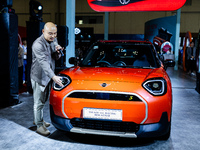 Jin Han Ng, Sales Manager and Product Manager for MINI Asia, explains the All-Electric MINI Aceman during The Gaikindo Jakarta Auto Week in...