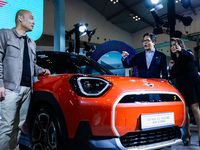 Jin Han Ng, Sales Manager and Product Manager for MINI Asia, Peter ''Sunny'' Medalla, President Director of BMW Group Indonesia, and Jodie O...