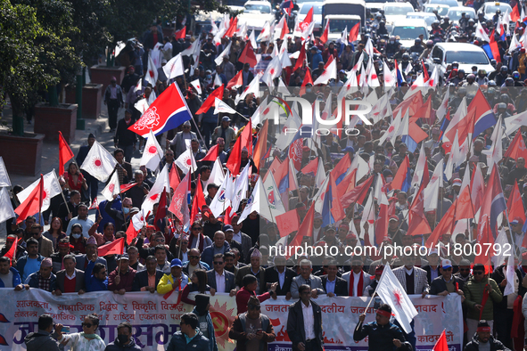 Cadres and supporters of CPN-UML hold a rally in the streets of Kathmandu as they take part in the show of power called by the party in Kath...