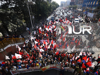 Cadres and supporters of CPN-UML hold a rally in the streets of Kathmandu as they take part in the show of power called by the party in Kath...