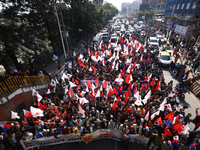 Cadres and supporters of CPN-UML hold a rally in the streets of Kathmandu as they take part in the show of power called by the party in Kath...