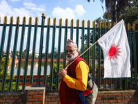 Cadres and supporters of CPN-UML hold a rally in the streets of Kathmandu as they take part in the show of power called by the party in Kath...