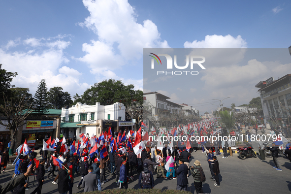 Cadres and supporters of CPN-UML hold a rally in the streets of Kathmandu as they take part in the show of power called by the party in Kath...