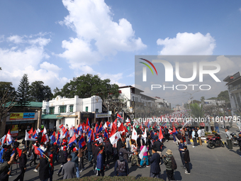 Cadres and supporters of CPN-UML hold a rally in the streets of Kathmandu as they take part in the show of power called by the party in Kath...