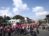 Cadres and supporters of CPN-UML hold a rally in the streets of Kathmandu as they take part in the show of power called by the party in Kath...