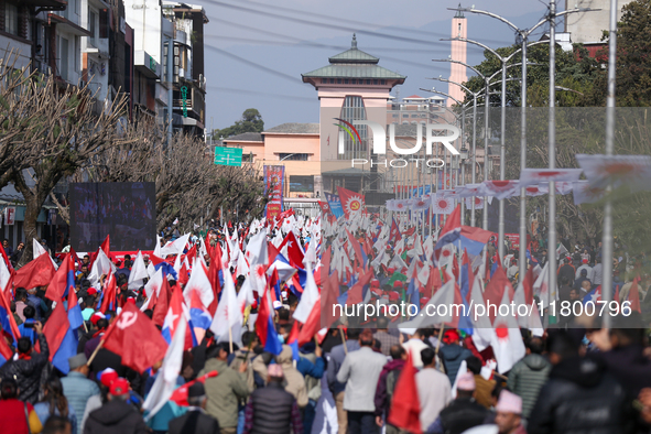 Cadres and supporters of CPN-UML hold a rally in the streets of Kathmandu as they take part in the show of power called by the party in Kath...