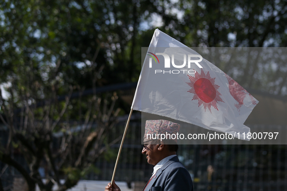 Cadres and supporters of CPN-UML hold a rally in the streets of Kathmandu as they take part in the show of power called by the party in Kath...