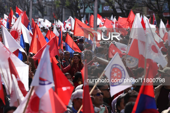 Cadres and supporters of CPN-UML hold a rally in the streets of Kathmandu as they take part in the show of power called by the party in Kath...