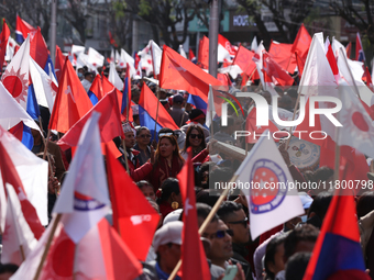 Cadres and supporters of CPN-UML hold a rally in the streets of Kathmandu as they take part in the show of power called by the party in Kath...