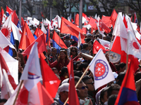 Cadres and supporters of CPN-UML hold a rally in the streets of Kathmandu as they take part in the show of power called by the party in Kath...