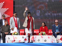 Nepal Prime Minister KP Sharma Oli (center) waves towards the party cadres and supporters during a rally in Kathmandu, Nepal, on November 22...