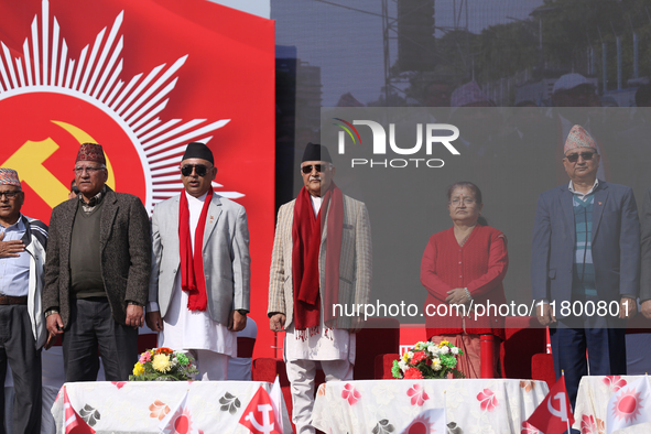 Nepal Prime Minister KP Sharma Oli (center) stands in line with other CPN-UML party leaders during a mass gathering ceremony in Kathmandu, N...