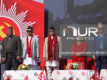 Nepal Prime Minister KP Sharma Oli (center) stands in line with other CPN-UML party leaders during a mass gathering ceremony in Kathmandu, N...