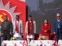 Nepal Prime Minister KP Sharma Oli (center) stands in line with other CPN-UML party leaders during a mass gathering ceremony in Kathmandu, N...