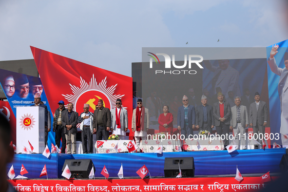 Nepal Prime Minister KP Sharma Oli (center) stands in line with other CPN-UML party leaders during a mass gathering ceremony in Kathmandu, N...