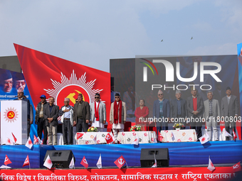 Nepal Prime Minister KP Sharma Oli (center) stands in line with other CPN-UML party leaders during a mass gathering ceremony in Kathmandu, N...