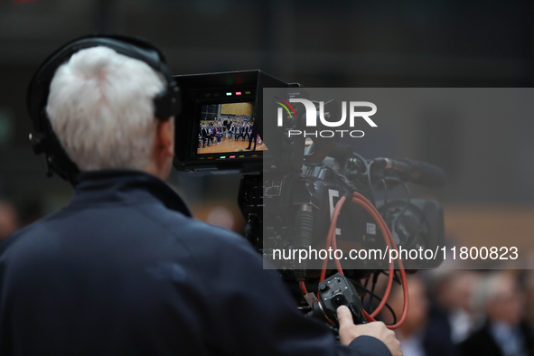 A TV camera operator attends a meeting with presidential candidate Rafal Trzaskowski at Hala Com-Com in Nowa Huta in Krakow, Poland, on Nove...