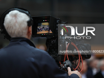 A TV camera operator attends a meeting with presidential candidate Rafal Trzaskowski at Hala Com-Com in Nowa Huta in Krakow, Poland, on Nove...