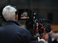 A TV camera operator attends a meeting with presidential candidate Rafal Trzaskowski at Hala Com-Com in Nowa Huta in Krakow, Poland, on Nove...