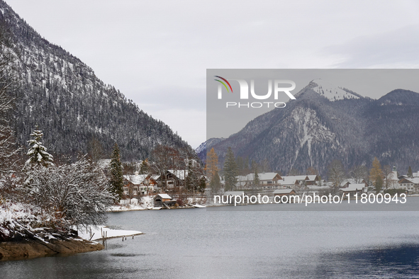 In the village of Walchensee in Upper Bavaria, in the district of Bad Tolz-Wolfratshausen, on the shores of Lake Walchensee, a winter atmosp...