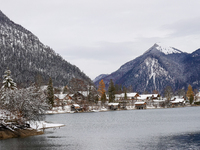 In the village of Walchensee in Upper Bavaria, in the district of Bad Tolz-Wolfratshausen, on the shores of Lake Walchensee, a winter atmosp...