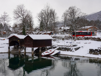 In the village of Walchensee in Upper Bavaria, in the district of Bad Tolz-Wolfratshausen, on the shores of Lake Walchensee, a winter atmosp...