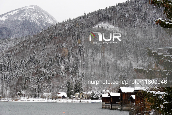 In the village of Walchensee in Upper Bavaria, in the district of Bad Tolz-Wolfratshausen, on the shores of Lake Walchensee, a winter atmosp...