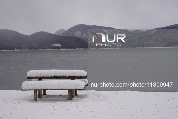 In the village of Walchensee in Upper Bavaria, in the district of Bad Tolz-Wolfratshausen, on the shores of Lake Walchensee, a winter atmosp...