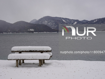 In the village of Walchensee in Upper Bavaria, in the district of Bad Tolz-Wolfratshausen, on the shores of Lake Walchensee, a winter atmosp...