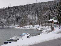 In the village of Walchensee in Upper Bavaria, in the district of Bad Tolz-Wolfratshausen, on the shores of Lake Walchensee, a winter atmosp...