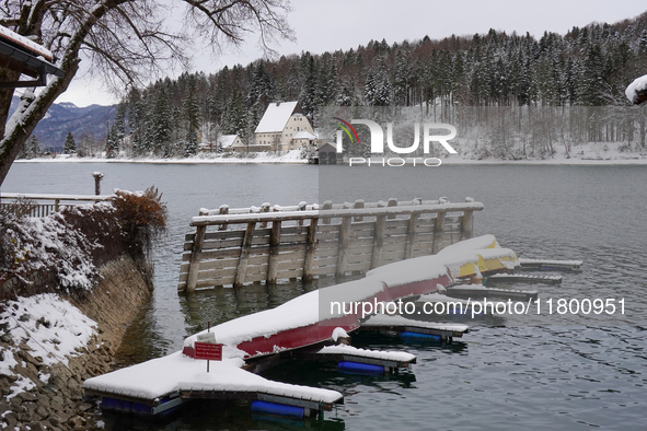 In the village of Walchensee in Upper Bavaria, in the district of Bad Tolz-Wolfratshausen, on the shores of Lake Walchensee, a winter atmosp...