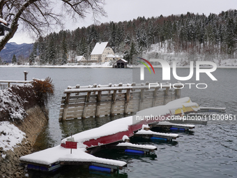 In the village of Walchensee in Upper Bavaria, in the district of Bad Tolz-Wolfratshausen, on the shores of Lake Walchensee, a winter atmosp...